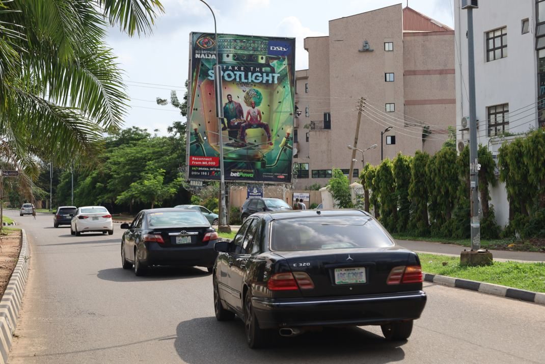 Portrait billboard at Area 3 Junction by First Bank, Garki, Abuja