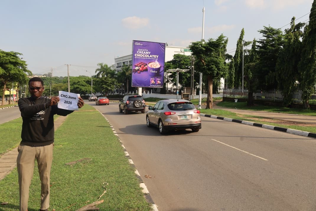 Portrait billboard at Michael Okpara Street, Wuse Zone 5, opposite Johnwood Hotel, Abuja