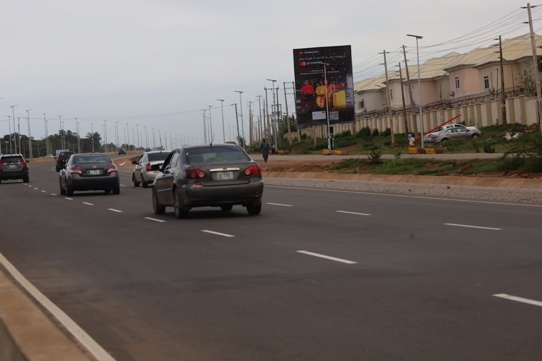 Portrait billboard at Along AICL Estate, Apo, Abuja